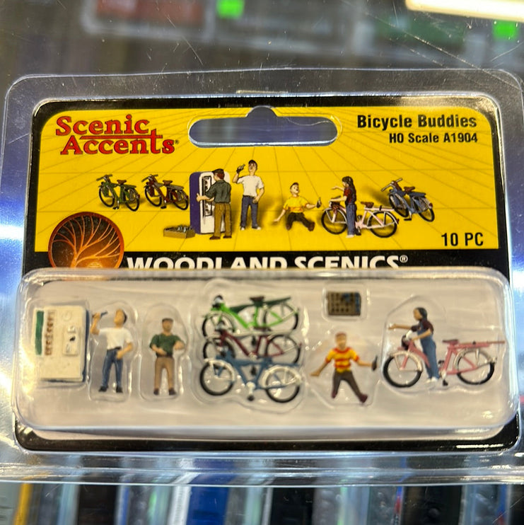 Bicycle Buddies - HO Scale - A set of four kids, with their bikes, take a break at the old pop machine