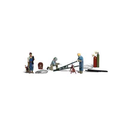 Welders & Accessories - HO Scale - A set of three men, with protective welding helmets and gloves, working with an assortment of mig and spot welders, a plasma cutter and gas cylinders - complete with angle iron pieces