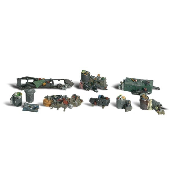 Assorted Junk -  HO Scale - Old trash cans, spent motors, ancient furnaces and other junk piles are scattered around